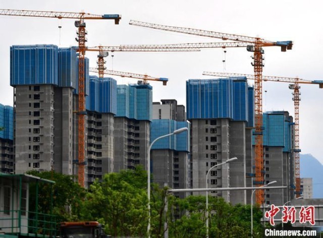 资料图：正在建设中的房地产楼盘。 <a target='_blank' href='/'><p  align=